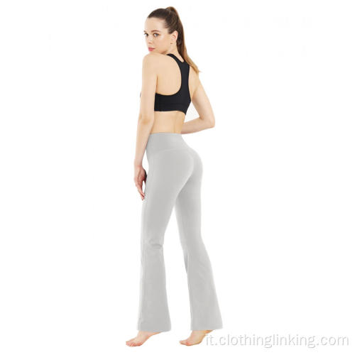 Pantaloni da yoga da donna con stivaletti neri